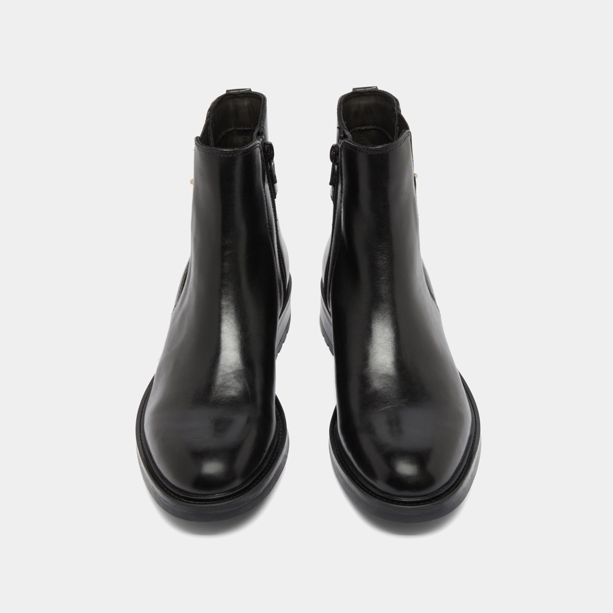 Boots basses &agrave; talons crant&eacute;s en cuir noir | GABIN | Jonak
