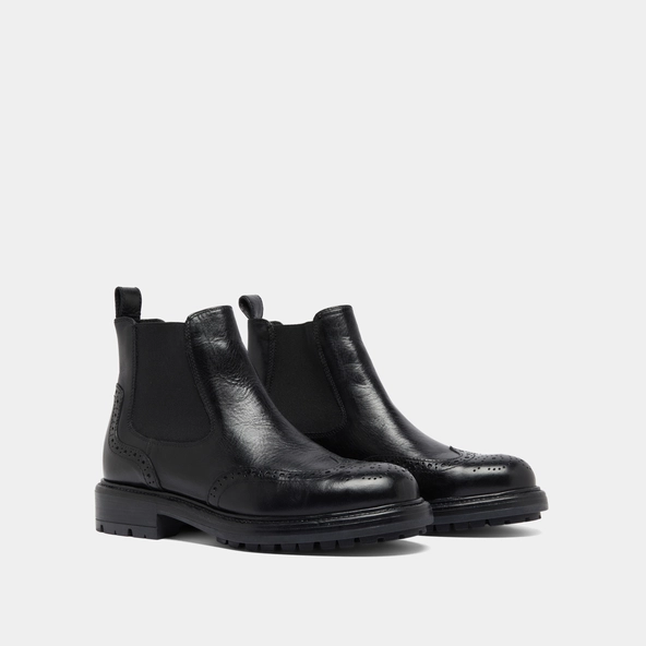 Boots &agrave; semelles crant&eacute;es en cuir noir | CELIA | Jonak