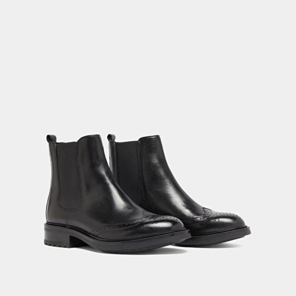Boots basses à élastiques et détails ajourés en cuir noir | GADDY | Jonak