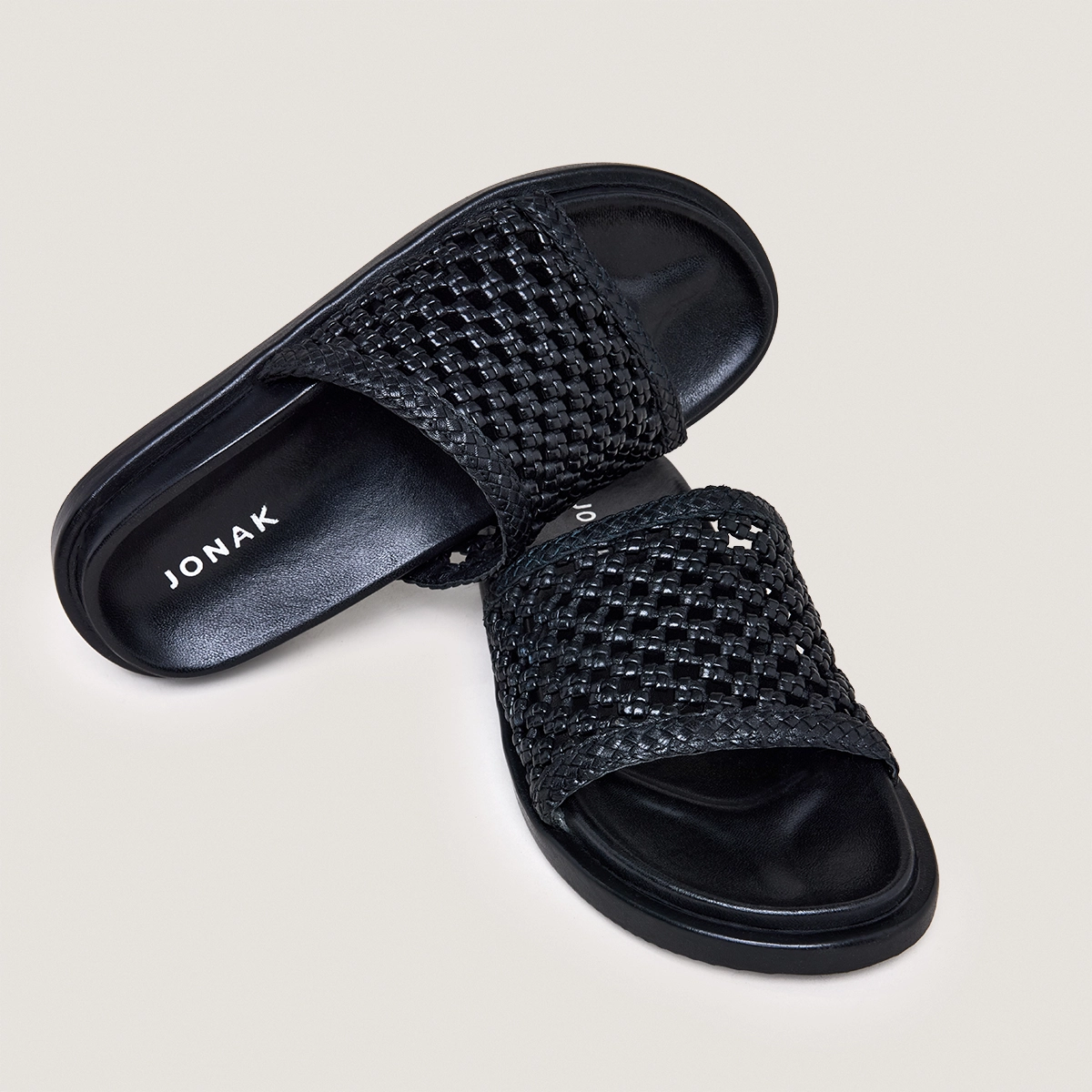 Mules ajourées en cuir noir | WOZART | Jonak