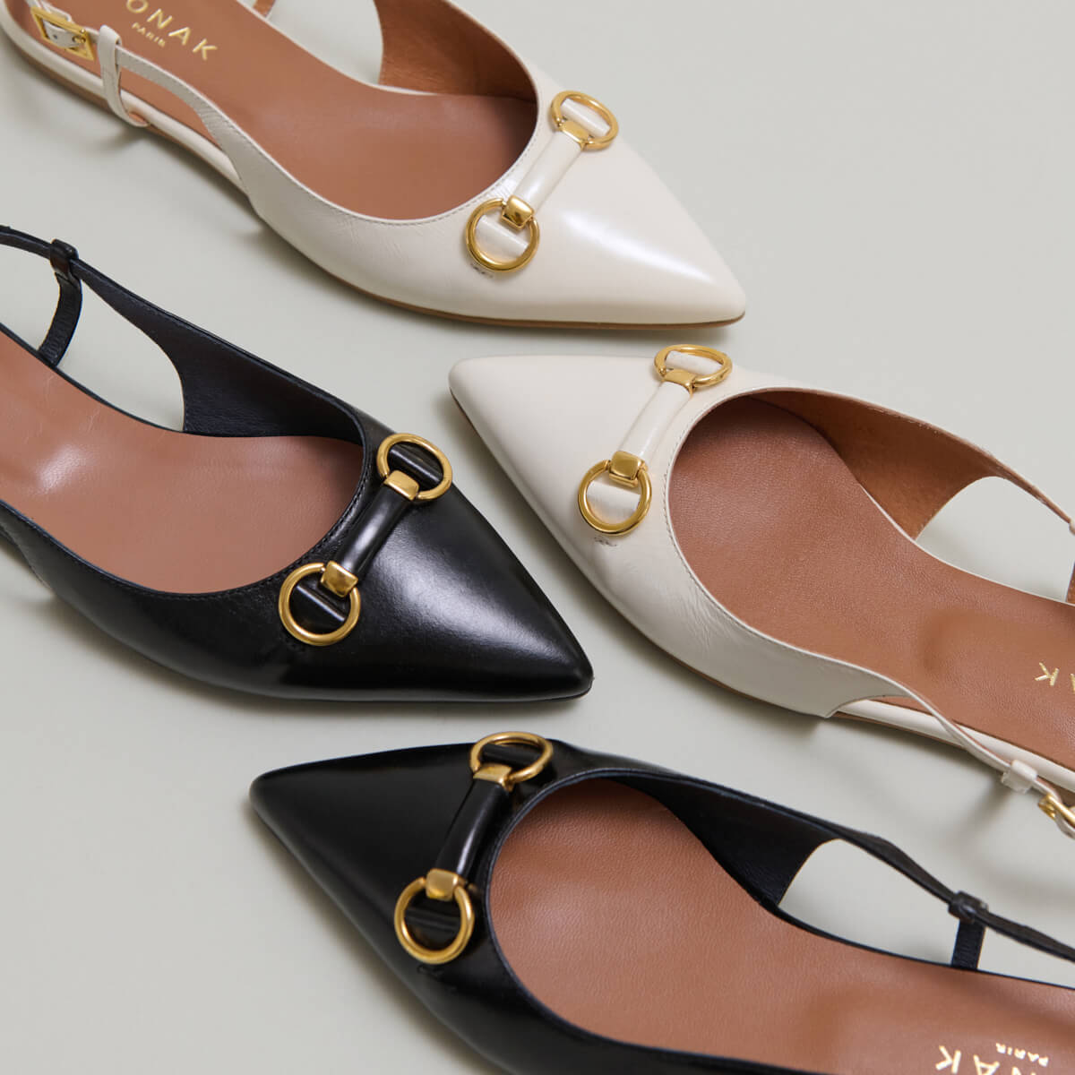 Ballerines slingbacks à bouts pointus et mors dorés en cuir noir | DEDICACE | Jonak