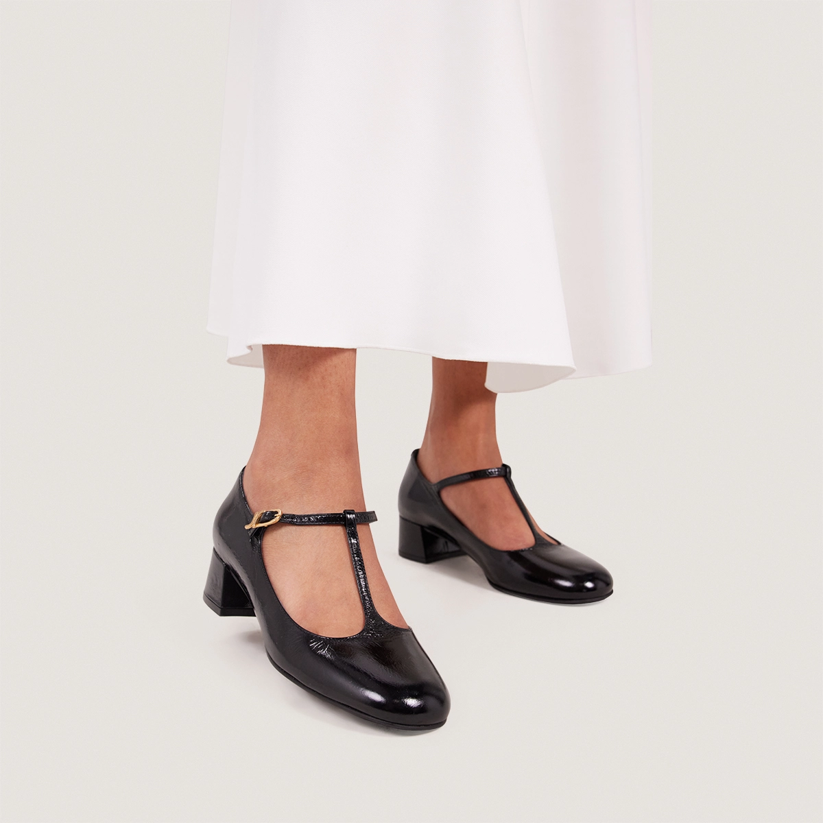 Salomés à petits talons en cuir brillant noir | DALOME | Jonak