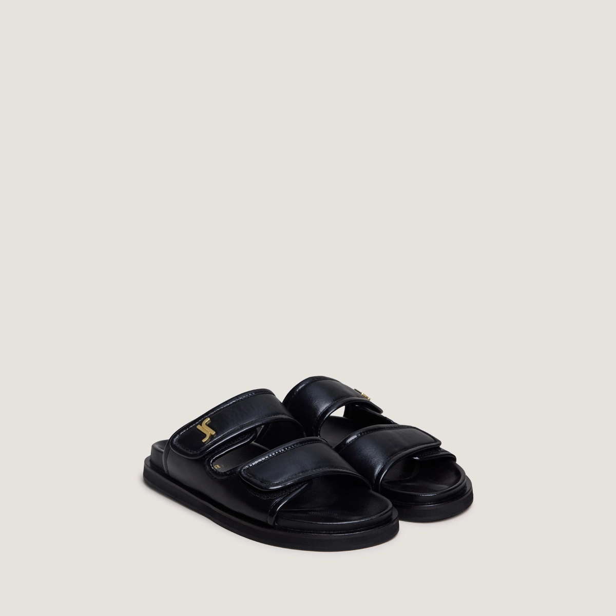Mules à monogrammes en cuir noir | WIN | Jonak