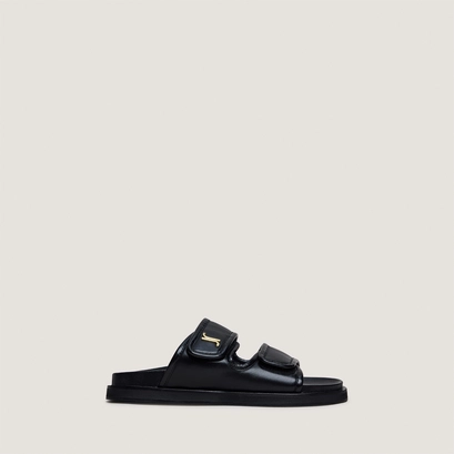 Mules &agrave; monogrammes en cuir noir | WIN | Jonak