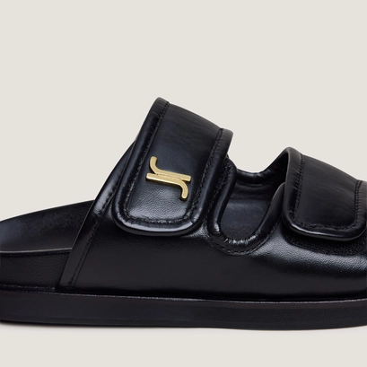 Mules &agrave; monogrammes en cuir noir | WIN | Jonak