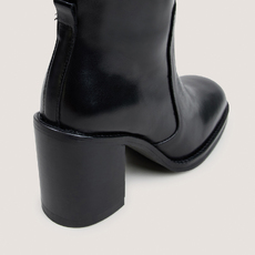 Bottes &agrave; talons d&eacute;bordants noir