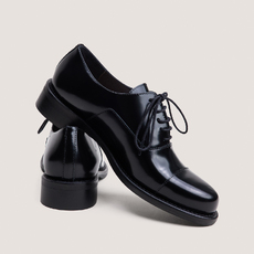 Mocassins &agrave; lacets et bouts ronds noir