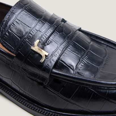 Mocassins à bouts ronds et monogrammes noir