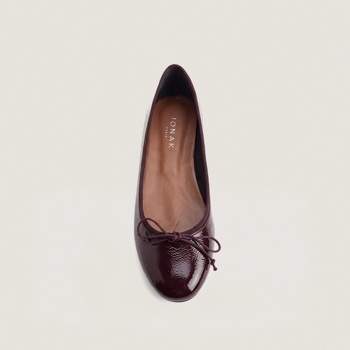 Ballerines &agrave; petits lacets en vernis pliss&eacute; bordeaux | DALLERINE | Jonak