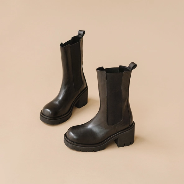 Bottes à semelles crantées et élastiques en cuir noir | REAGAN | Jonak