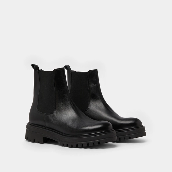 Boots &agrave; semelles crant&eacute;es et &eacute;lastiques en cuir noir | AMANDINE | Jonak