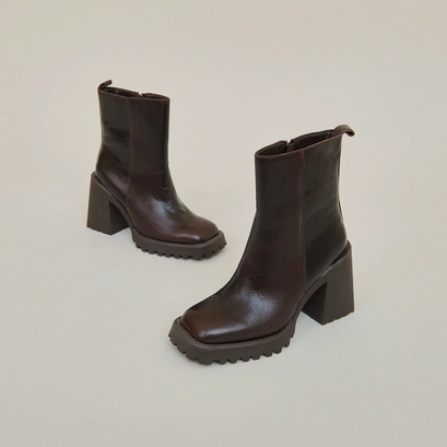 Bottines &agrave; semelles crant&eacute;es et bouts ca... en cuir marron | GENEVE