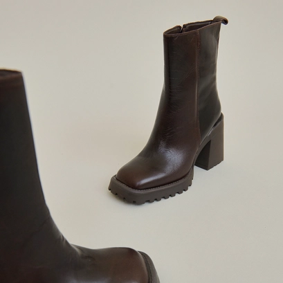 Bottines &agrave; semelles crant&eacute;es et bouts ca... en cuir marron | GENEVE