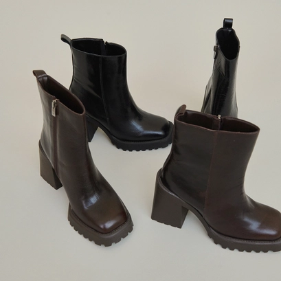 Bottines &agrave; semelles crant&eacute;es et bouts ca... en cuir marron | GENEVE