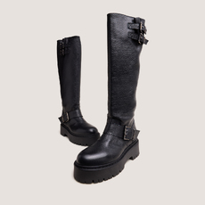 Bottes &agrave; sangles et semelles crant&eacute;es noir