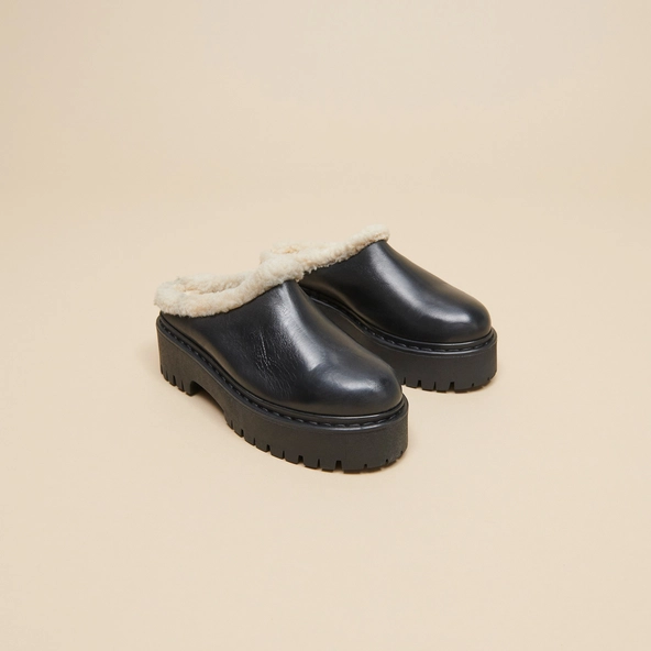 Mules à bouts ronds et semelles crantées... en cuir noir | RAYA | Jonak