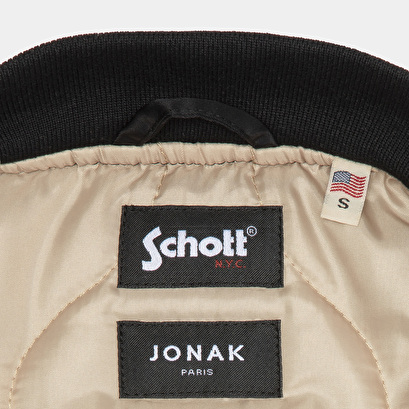 The Jonak Bomber - Jonak x Schott en nylon noir et détails en cuir | THE