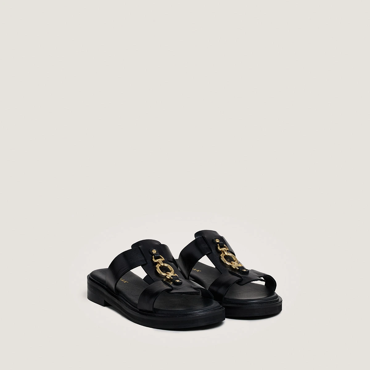 Mules à mors dorés en cuir noir | DOP | Jonak
