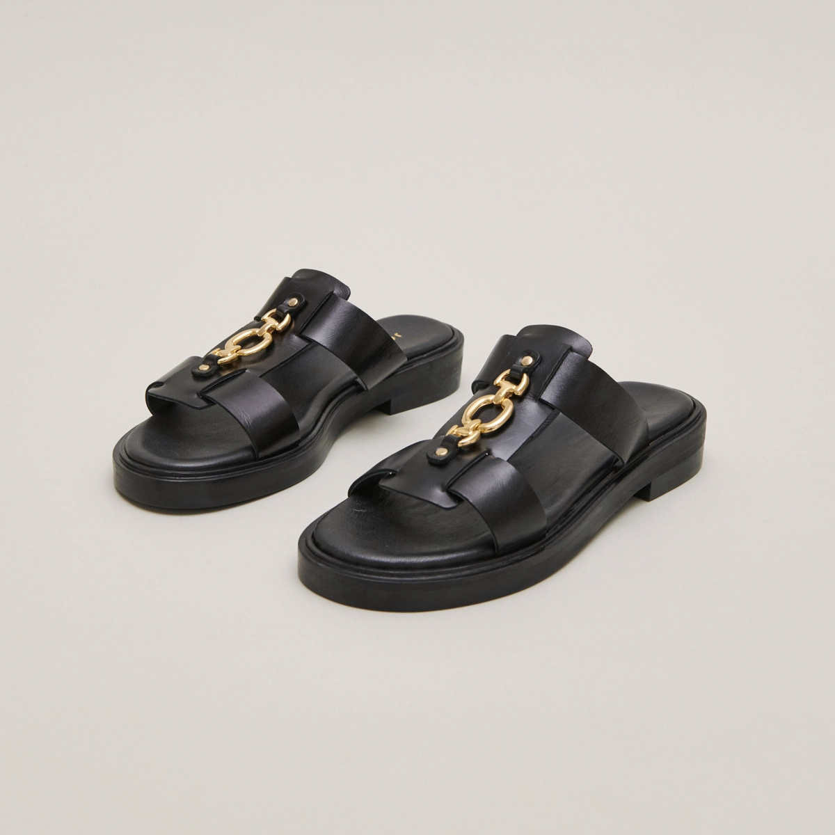 Mules à mors dorés en cuir noir | DOP | Jonak